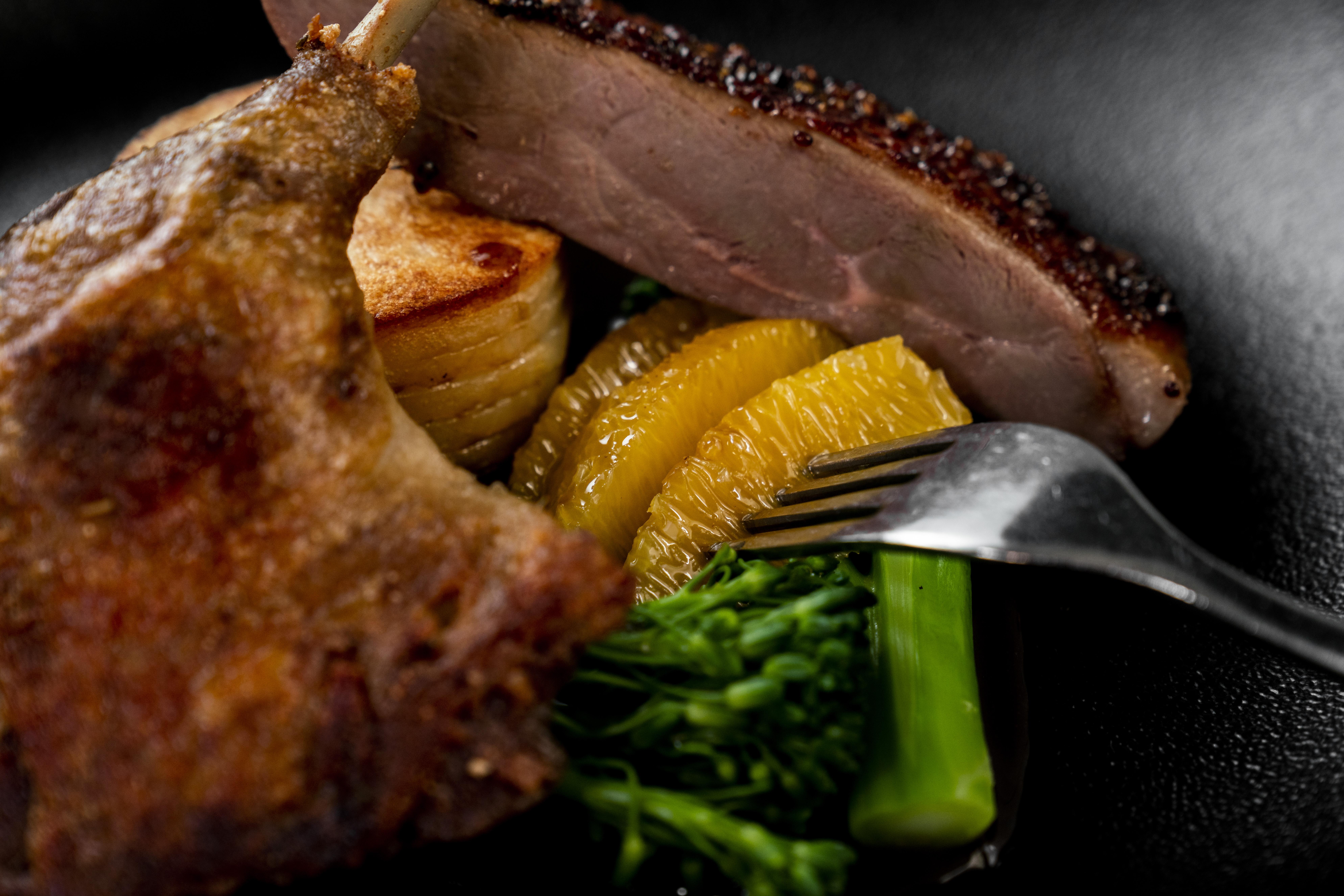 The Point Brisbane Hotel Luaran gambar A duck confit with orange and vegetables
