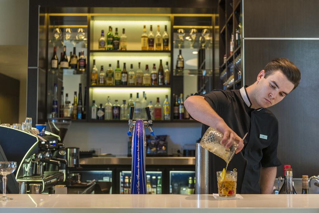 The Point Brisbane Hotel Luaran gambar A bartender at work
